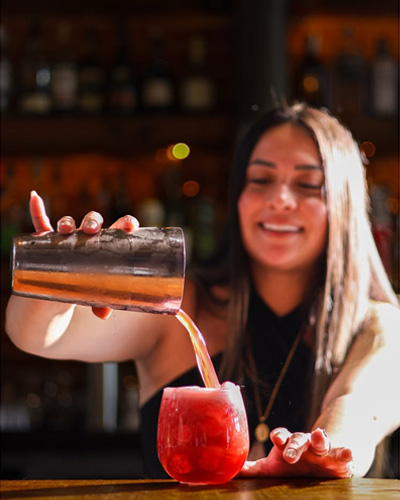 Lady Pouring a Drink